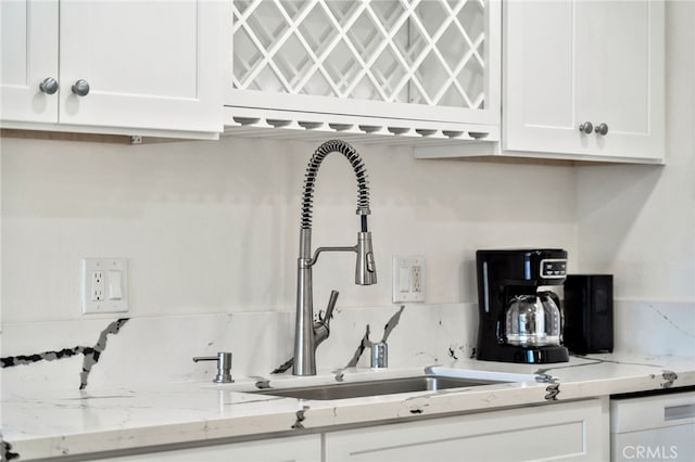 17121 Granada Ln, Huntington Beach, CA 92647 - kitchen with a sink, white cabinetry, and tasteful backsplash