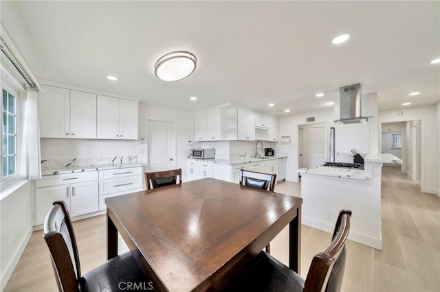 17121 Granada Ln, Huntington Beach, CA 92647 - dining area with light wood-type flooring, recessed lighting, and baseboards