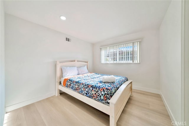 17121 Granada Ln, Huntington Beach, CA 92647 - bedroom featuring wood finished floors, baseboards, and recessed lighting
