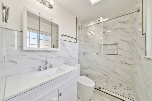 17121 Granada Ln, Huntington Beach, CA 92647 - full bath featuring toilet, a marble finish shower, vanity, and tile walls