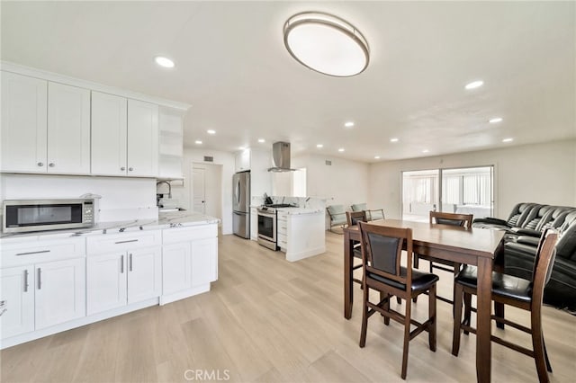 17121 Granada Ln, Huntington Beach, CA 92647 - dining area with recessed lighting and light wood-type flooring