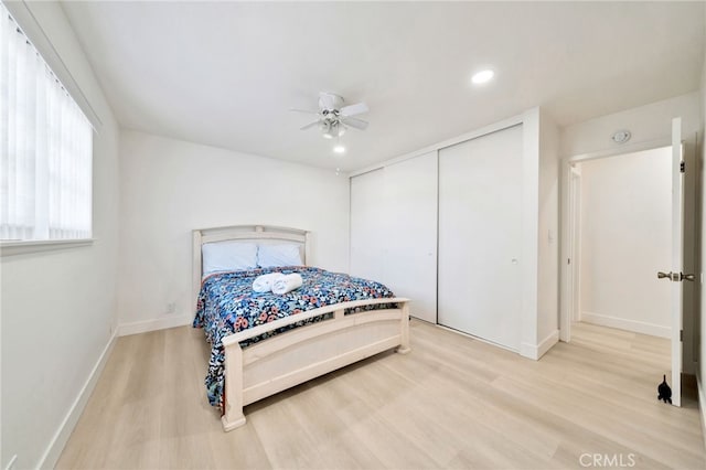 17121 Granada Ln, Huntington Beach, CA 92647 - bedroom with light wood finished floors, baseboards, recessed lighting, a closet, and a ceiling fan