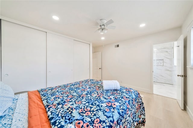 17121 Granada Ln, Huntington Beach, CA 92647 - bedroom featuring a closet, recessed lighting, a ceiling fan, light wood-style flooring, and connected bathroom