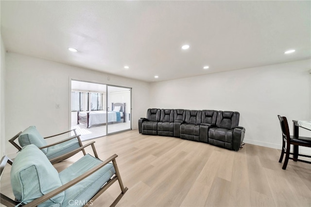 17121 Granada Ln, Huntington Beach, CA 92647 - living room featuring light wood-type flooring and recessed lighting