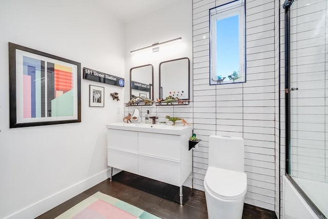 403 Black Canyon Pl, Ramona, CA 92065 - bathroom with toilet, vanity, baseboards, and washtub / shower combination