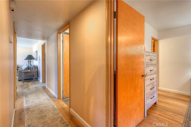 233 E Swift St, Orland, CA 95963 - hall featuring light wood-style floors and baseboards