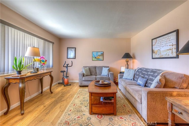 233 E Swift St, Orland, CA 95963 - living room featuring wood finished floors and baseboards