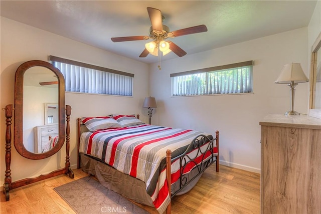 233 E Swift St, Orland, CA 95963 - bedroom with wood finished floors, baseboards, and a ceiling fan