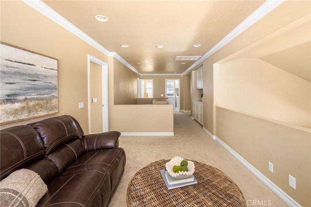 11 Berlamo, Rancho Santa Margarita, CA 92688 - living room with light colored carpet, crown molding, baseboards, and recessed lighting