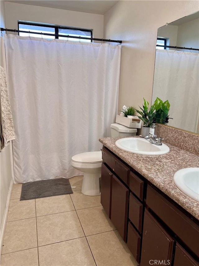 1125 Grand Ave E Unit A, Pomona, CA 91766 - full bathroom featuring double vanity, tile patterned floors, and a shower with shower curtain