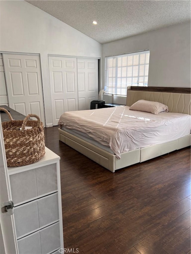 1125 Grand Ave E Unit A, Pomona, CA 91766 - bedroom featuring a textured ceiling, vaulted ceiling, and wood finished floors