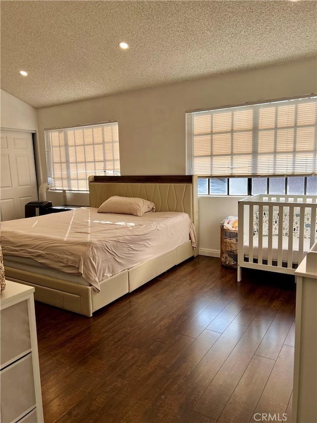 1125 Grand Ave E Unit A, Pomona, CA 91766 - bedroom featuring a textured ceiling, hardwood / wood-style flooring, and recessed lighting
