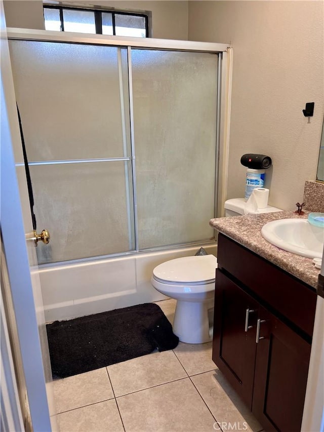 1125 Grand Ave E Unit A, Pomona, CA 91766 - full bathroom with vanity, combined bath / shower with glass door, and tile patterned floors