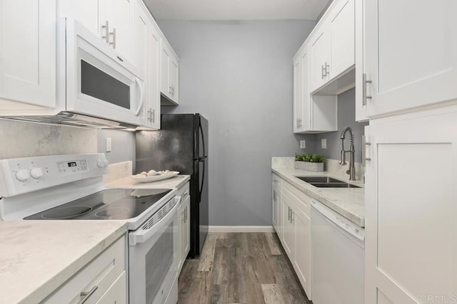 8328 Regents Rd Unit 1K, San Diego, CA 92122 - kitchen with white appliances, a sink, dark wood-type flooring, white cabinets, and light countertops
