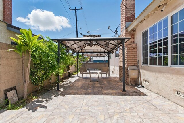 302 E 213th St, Carson, CA 90745 - view of patio / terrace featuring a gazebo and a detached carport