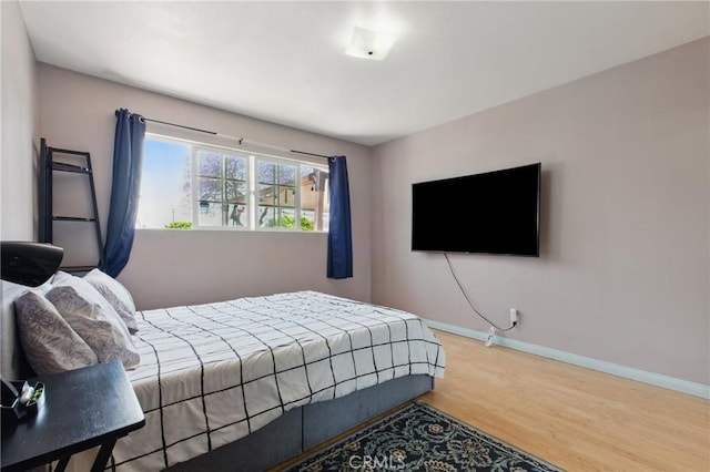 302 E 213th St, Carson, CA 90745 - bedroom featuring wood finished floors and baseboards