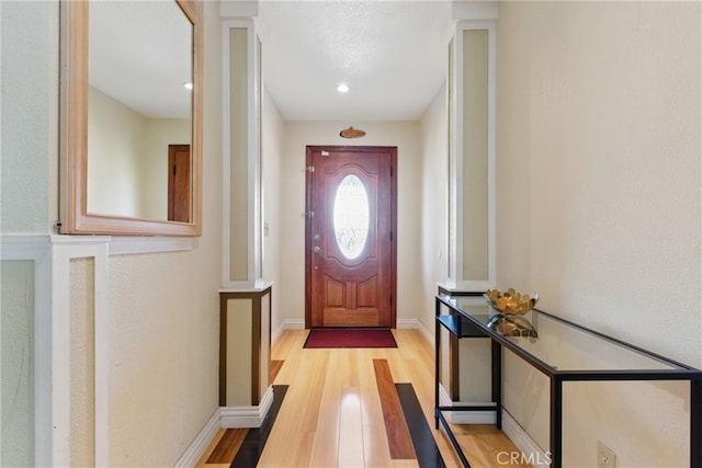 302 E 213th St, Carson, CA 90745 - entryway featuring wood finished floors and baseboards