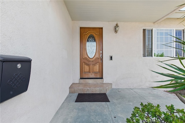 302 E 213th St, Carson, CA 90745 - property entrance featuring stucco siding