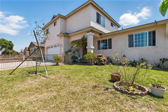 302 E 213th St, Carson, CA 90745 - view of front facade with stucco siding and a garage
