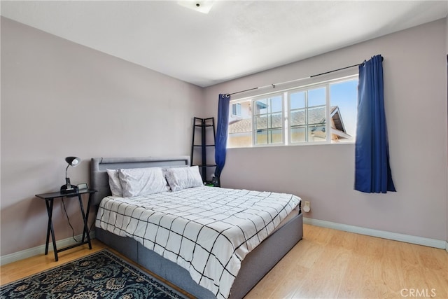 302 E 213th St, Carson, CA 90745 - bedroom featuring baseboards and wood finished floors