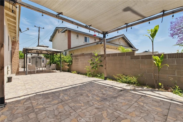 302 E 213th St, Carson, CA 90745 - fenced backyard featuring a gazebo and a patio