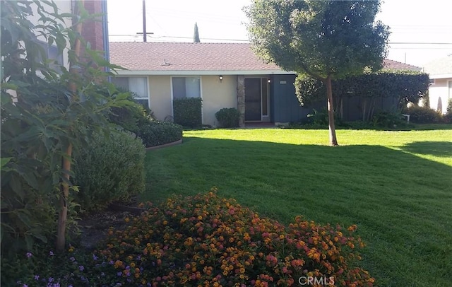 2652 College Ln, La Verne, CA 91750 - back of house with a lawn and stucco siding