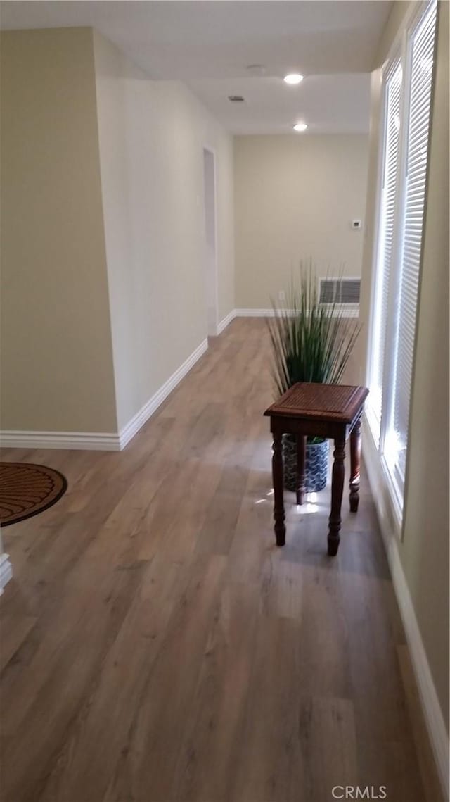2652 College Ln, La Verne, CA 91750 - corridor with baseboards and wood finished floors