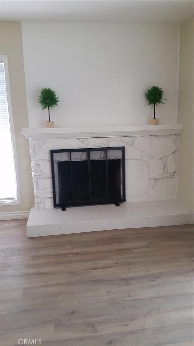 2652 College Ln, La Verne, CA 91750 - detailed view of a high end fireplace, wood finished floors, and baseboards