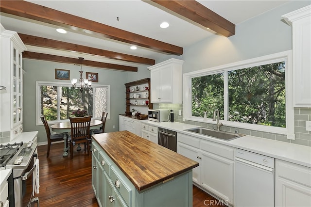 405 Terrace Rd, Lake Arrowhead, CA 92352 - kitchen featuring a sink, butcher block counters, stainless steel appliances, dark wood-type flooring, and decorative backsplash