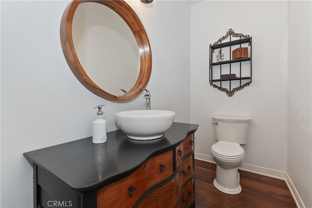 405 Terrace Rd, Lake Arrowhead, CA 92352 - half bath featuring vanity, wood finished floors, baseboards, and toilet