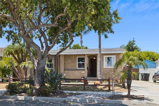 20005 Anza Ave, Torrance, CA 90503 - ranch-style home with stucco siding, driveway, and a fenced front yard