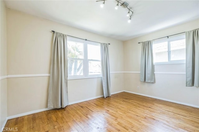20005 Anza Ave, Torrance, CA 90503 - unfurnished room with light wood-type flooring and track lighting