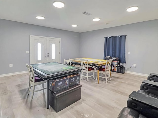 5436 Bonfair Ave, Lakewood, CA 90712 - game room featuring baseboards, light wood-style flooring, and french doors