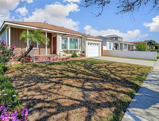 5436 Bonfair Ave, Lakewood, CA 90712 - ranch-style home featuring concrete driveway, a garage, board and batten siding, and entry steps