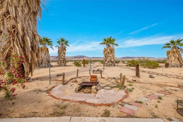380 Mack Ln Unit 29, Palms, CA 92277 - view of yard with a mountain view and a view of rural / pastoral area