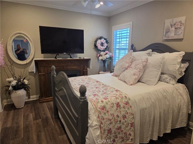 25687 Red Hawk Rd, Corona, CA 92883 - bedroom featuring dark wood-type flooring, baseboards, crown molding, and a ceiling fan