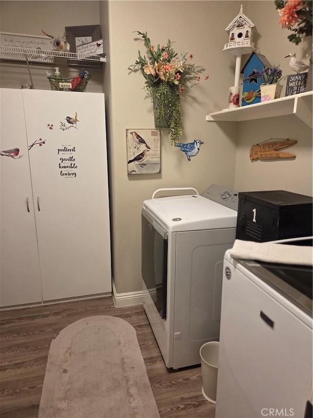 25687 Red Hawk Rd, Corona, CA 92883 - washroom featuring washer and dryer, wood finished floors, and baseboards