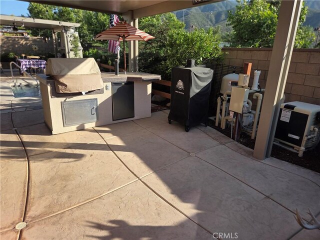25687 Red Hawk Rd, Corona, CA 92883 - view of patio featuring a mountain view