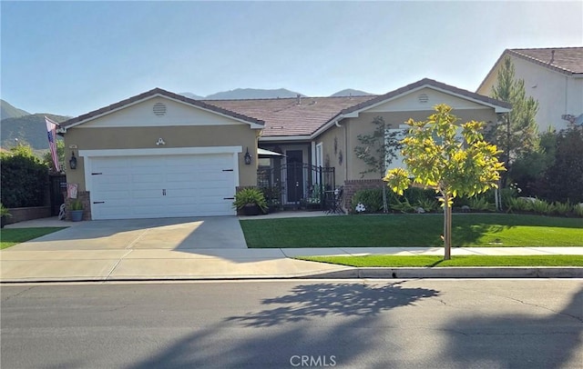 25687 Red Hawk Rd, Corona, CA 92883 - ranch-style home with a garage, stucco siding, driveway, and a front lawn