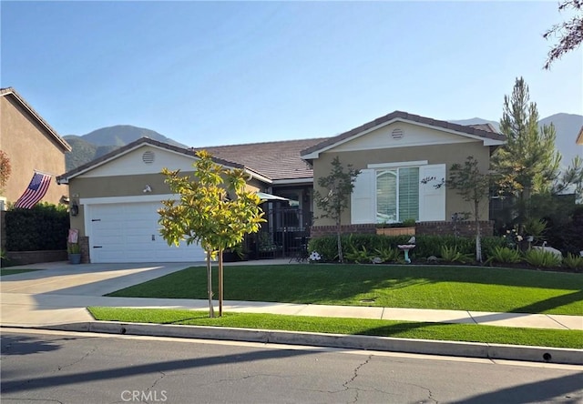 25687 Red Hawk Rd, Corona, CA 92883 - ranch-style home featuring brick siding, concrete driveway, an attached garage, a front yard, and stucco siding