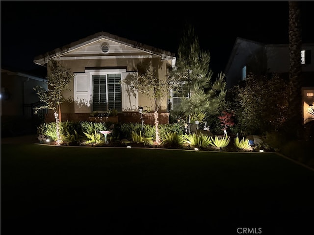 25687 Red Hawk Rd, Corona, CA 92883 - view of front of property with a lawn and stucco siding