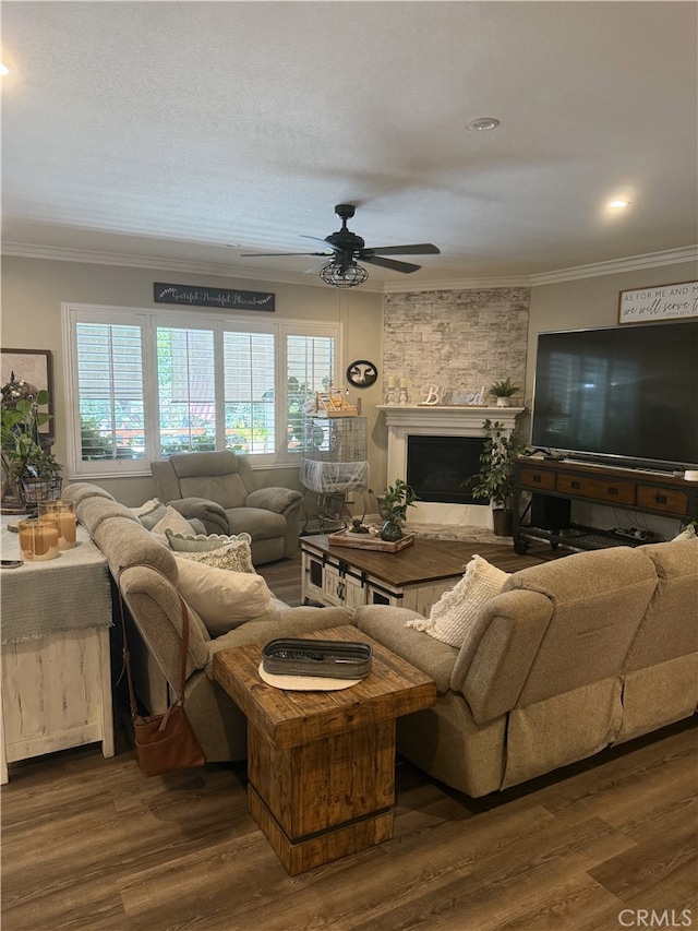 25687 Red Hawk Rd, Corona, CA 92883 - living room featuring crown molding, ceiling fan, wood finished floors, and a fireplace
