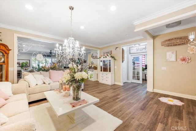 25687 Red Hawk Rd, Corona, CA 92883 - living area featuring crown molding, a chandelier, wood finished floors, and recessed lighting