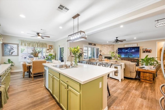 25687 Red Hawk Rd, Corona, CA 92883 - kitchen with green cabinetry, a ceiling fan, recessed lighting, light wood-style flooring, and healthy amount of natural light