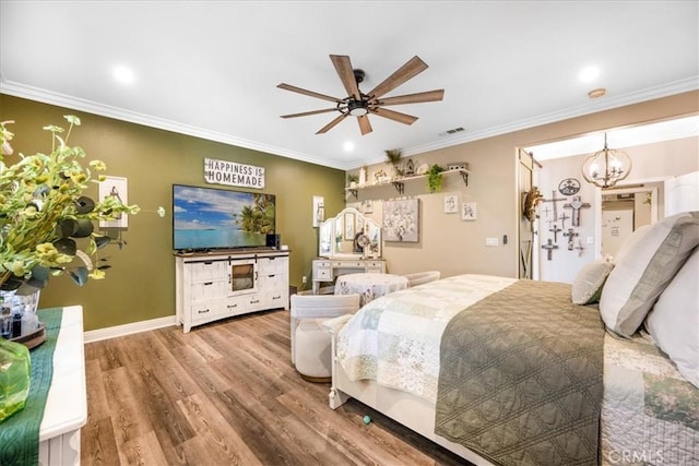 25687 Red Hawk Rd, Corona, CA 92883 - bedroom with wood finished floors, ornamental molding, a chandelier, recessed lighting, and ceiling fan