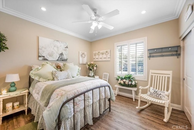 25687 Red Hawk Rd, Corona, CA 92883 - bedroom featuring wood finished floors, crown molding, recessed lighting, and ceiling fan