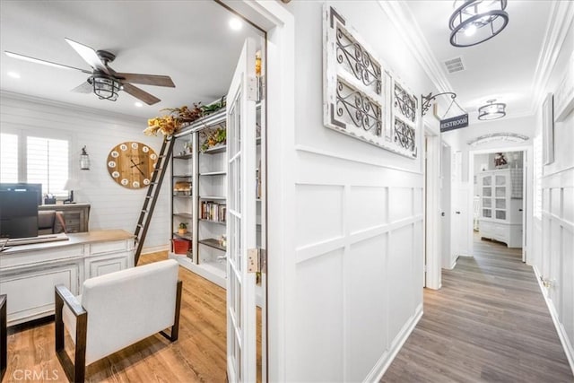25687 Red Hawk Rd, Corona, CA 92883 - hall with ornamental molding, an office area, wood finished floors, and recessed lighting