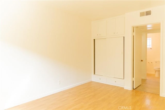 919 E Ln Palma Dr Unit 4, Inglewood, CA 90301 - unfurnished room with light wood finished floors and baseboards