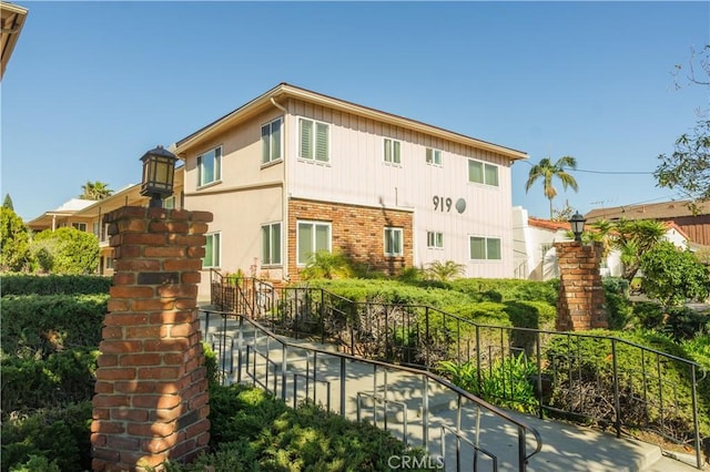919 E Ln Palma Dr Unit 4, Inglewood, CA 90301 - rear view of house with brick siding