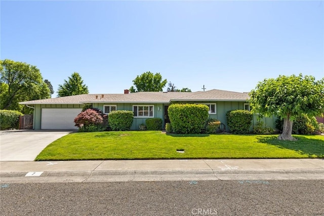 7 Pinecrest Cir, Chico, CA 95926 - ranch-style house featuring board and batten siding, a garage, and concrete driveway